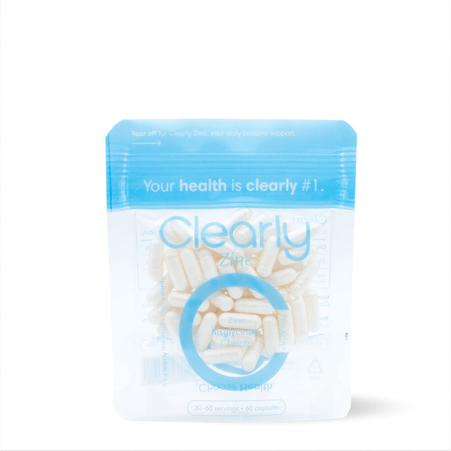 Clearly Zinc supplement bottle with zinc tablets, displayed on a clean background for dietary health and mineral support.